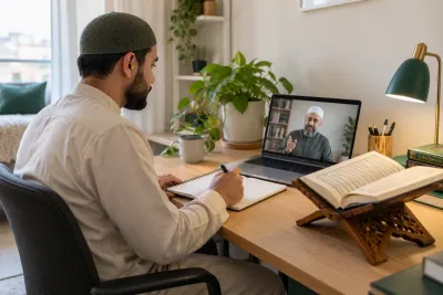 An adult Muslim man revising a short Quran passage during a calm one-to-one video lesson in a calm home study with Quran learning materials
