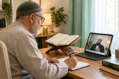 An older adult learner in glasses studying a Quran reading lesson on a large tablet in a calm home study with Quran learning materials